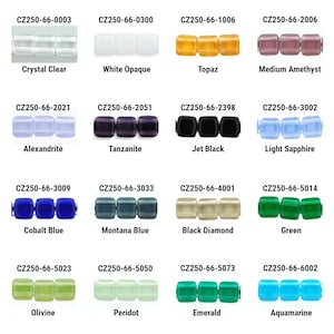 May include: Assortment of 12 colors of square glass beads. The beads are arranged in four rows of three beads each. The colors are: Crystal Clear, White Opaque, Topaz, Medium Amethyst, Alexandrite, Tanzanite, Jet Black, Light Sapphire, Cobalt Blue, Montana Blue, Black Diamond, Green, Olivine, Peridot, Emerald, and Aquamarine.