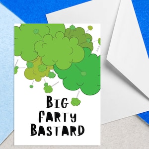 May include: A white card with green cartoon fart clouds and the text "BIG PARTY BASTARD" in black.
