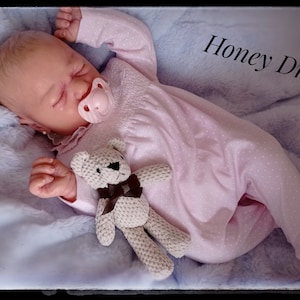 Lifelike baby dolls that cry and pee clearance