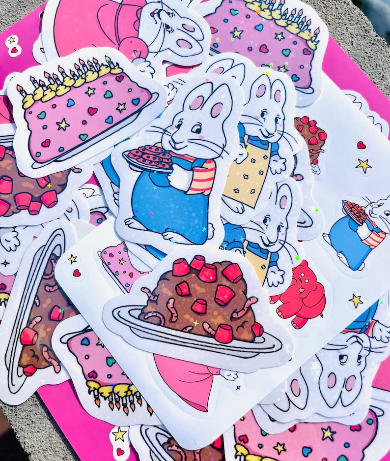 Peut inclure: Un ensemble d'autocollants color&eacute;s repr&eacute;sentant un personnage de lapin de dessin anim&eacute;. Les autocollants comprennent des images du lapin tenant une assiette de biscuits, un g&acirc;teau d'anniversaire et une assiette de vers. Les autocollants sont parfaits pour ajouter une touche de fantaisie &agrave; n'importe quel projet.