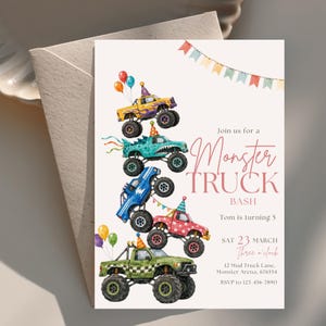 May include: A rectangular party invitation card featuring a watercolor illustration of five stacked monster trucks in yellow, teal, blue, red, and green, each wearing a party hat. Colorful balloons and bunting decorate the scene with text reading Join us for a Monster Truck BASH, Tom is turning 5, SAT 23 MARCH, Three o'clock, 12 Mud Truck Lane, Monster Arena, 676554, RSVP to 123-456-7890.