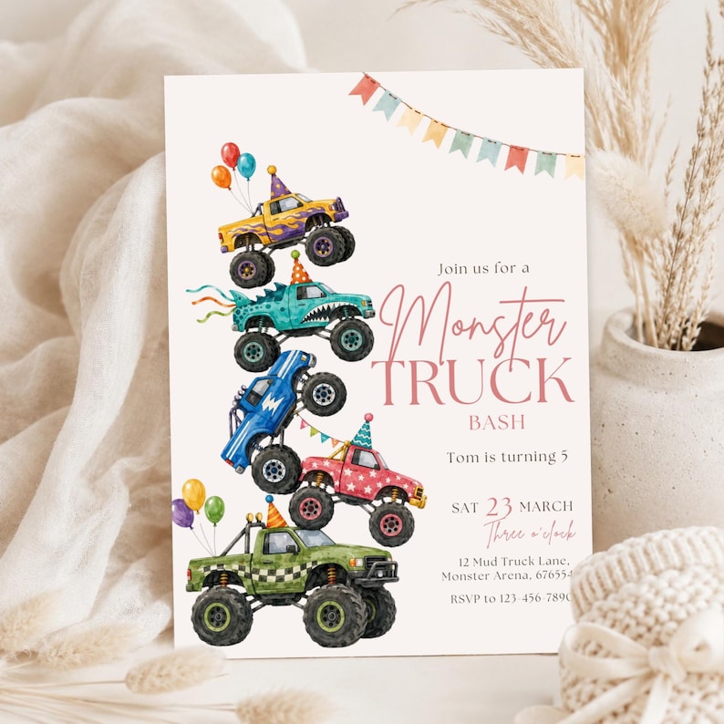 May include: A birthday invitation card featuring a stack of five colorful monster trucks wearing party hats, decorated with balloons and bunting. The text reads: Join us for a Monster TRUCK BASH, Tom is turning 5, SAT 23 MARCH, Three o'clock, 12 Mud Truck Lane, Monster Arena, 676554, RSVP to 123-456-7890.