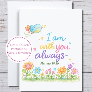 Peut inclure: Une carte A2 blanche et un ensemble d'enveloppes avec le texte "I am with you always" en écriture colorée. Un petit oiseau bleu vole au-dessus d'un champ de fleurs colorées. La carte mesure 10,8 x 14 cm.
