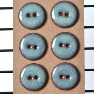 23 mm ceramic buttons with bordeaux/blue gradient