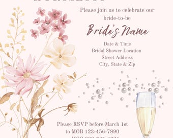 May include: A bridal shower invitation with a watercolor floral design and a glass of champagne. The invitation reads "Pearls, Petals & Prosecco" and includes the bride-to-be's name, date, time, location, and RSVP information. It also states "Pink or floral attire encouraged!" and "Registered at Amazon & Target."