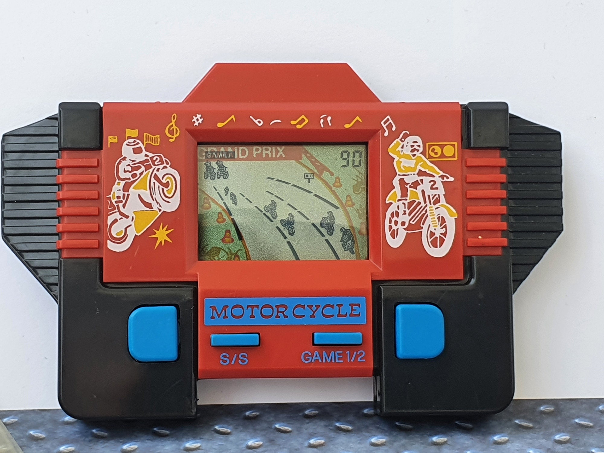 VINTAGE LCD Electronic Action Game Motorcycle by PEKA Toys 90s 