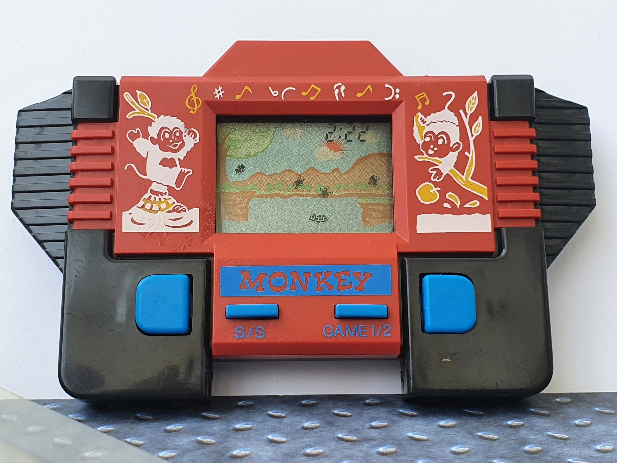 VINTAGE LCD Electronic Action Game Motorcycle by PEKA Toys 90s 