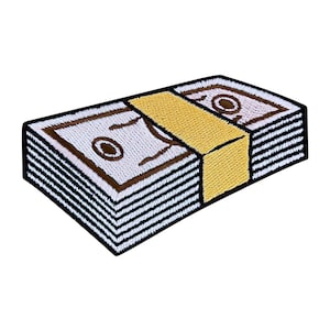 Op de afbeelding: Een stapel geld met een bruin en wit geborduurd ontwerp. Het geld is met een gele band bij elkaar gebonden.