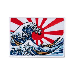 May include: A rectangular embroidered patch featuring a large blue ocean wave with white foam crests, brown wooden boats, and a distant mountain peak set against a background of a red sun with radiating red and white sunbeams.
