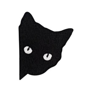 Pode incluir: Patch de cabeça de gato preto bordado com olhos brancos.