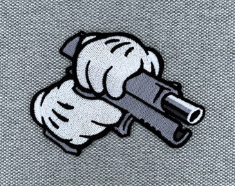 Patch Urbanski mains comiques avec arme pistolet à repasser 6,5 x 9 cm | Image thermocollante pour application d'un patch