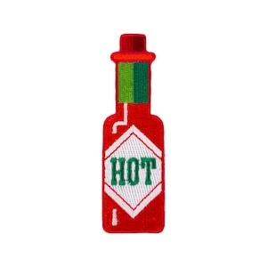 May include: Red and green embroidered hot sauce bottle patch with the word "HOT" in green letters on a white diamond shape.