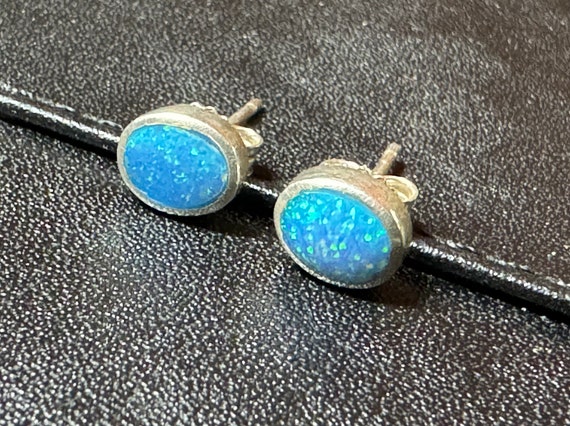 Engineered opal silver stud earrings - image 1