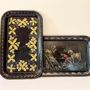 One-of-a-kind, hand painted metal trays from the 50s