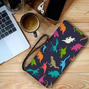 Cartera de mano con diseño de dinosaurio para mujer, tipo sobre, con cremallera, pequeña de cuero y con estampado personalizado.