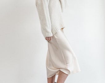 white half sleeve sweater