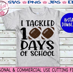 May include: A grey t-shirt with the text "I Tackled 100 Days of School" in black. Two brown footballs are next to the number 100. The text "INSTANT DOWNLOAD" is in a blue circle.