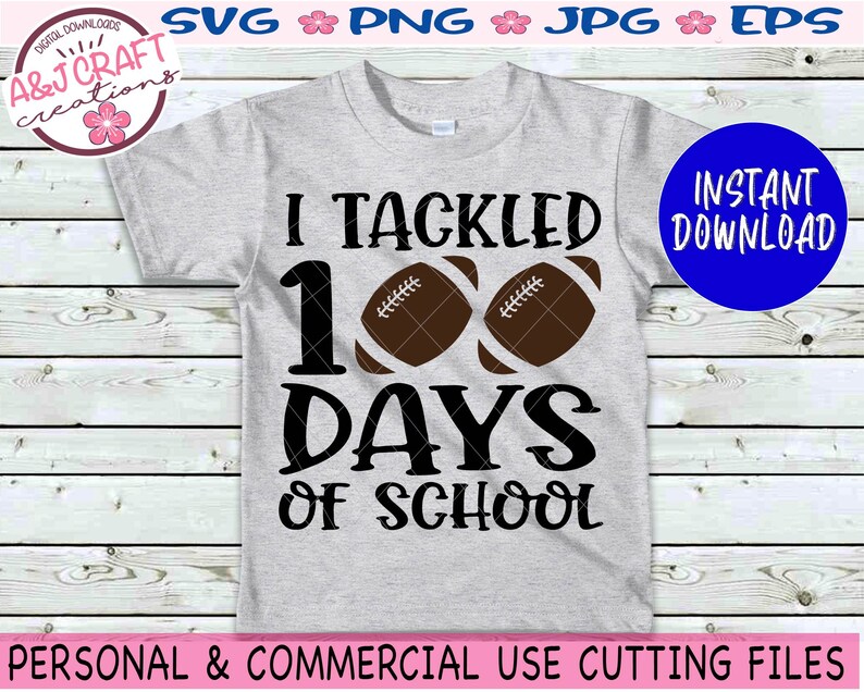 May include: A grey t-shirt with the text "I Tackled 100 Days of School" in black. Two brown footballs are next to the number 100. The text "INSTANT DOWNLOAD" is in a blue circle.