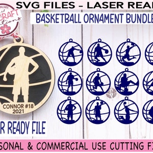 May include: A basketball ornament bundle with laser-ready SVG files. The design includes a wooden ornament with a basketball player silhouette and the text "CONNOR #18 2021". Additional ornaments feature basketball players in action. The text "LASER READY FILE" is also visible.
