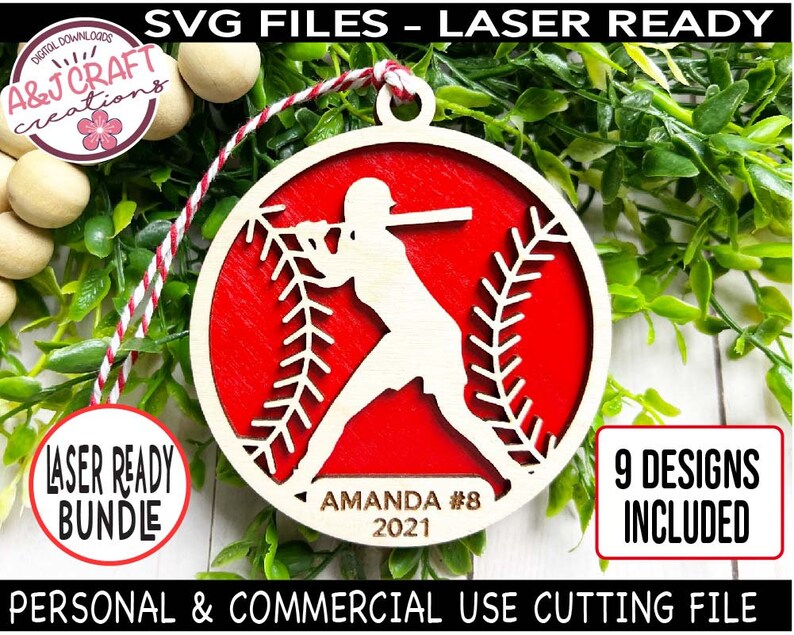 May include: A red and white baseball-themed ornament with a silhouette of a baseball player. The ornament is laser-cut and ready to be personalized with a name and year. The text on the ornament reads "AMANDA #8 2021".