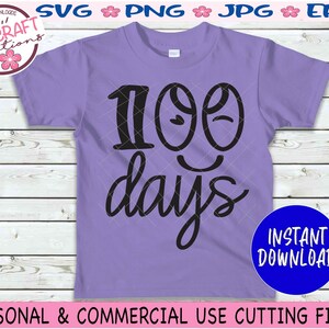 May include: Purple t-shirt with black text that says "100 days" with a smiley face design. The text is in a playful font.
