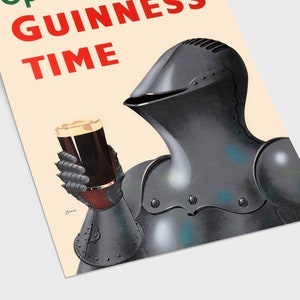 May include: Vintage poster featuring a knight in dark armor holding a pint of Guinness. The poster has the words "Guinness Time" in red and green. The knight's gauntlet holds the glass of dark beer with a creamy head.