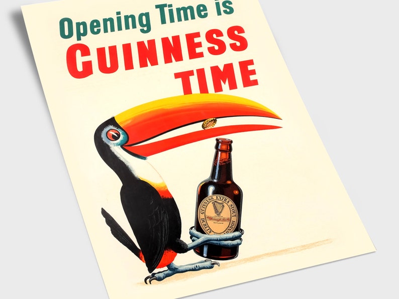 May include: A retro poster showing a toucan with a Guinness Extra Stout bottle. The toucan has a yellow, red, and white beak, with black and white feathers. The poster reads "Opening Time is Guinness Time" in green and red.