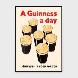 May include: A retro Guinness poster. It shows seven smiling pints of Guinness stout, with the text "A Guinness a day" in red and "Guinness is good for you" in black, on a cream background.