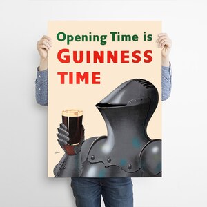 May include: Poster featuring a knight in armor holding a pint of Guinness. The poster has the text "Opening Time is GUINNESS TIME" in green and red. The knight's armor is dark gray, and the background is beige.