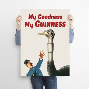 May include: A vintage poster with the text "My Goodness My Guinness" in red. The illustration features a cartoon ostrich with a surprised man in a blue uniform holding a bottle. The poster has a cream background.