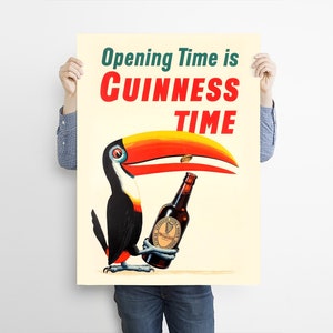 May include: A vintage-style poster advertising Guinness beer. The poster features a toucan holding a bottle of Guinness with the text "Opening Time is Guinness Time".
