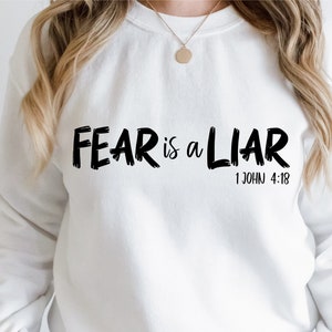 Fear Is a Liar Svg, 1 John 4:18 Svg Cut File, Christian Svg Quotes, Bible Verse Svg, Bible Quote Svg,Fear Is a Liar Svg T shirt Design Print