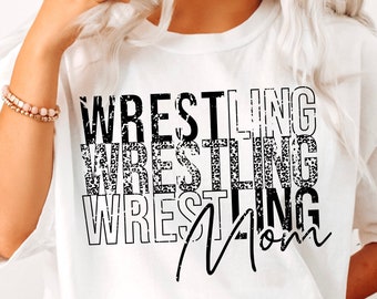 May include: White t-shirt with black text that reads "Wrestling Mom" in a layered, distressed font.