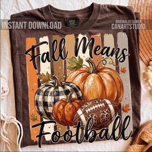 May include: Brown t-shirt with a fall-themed graphic. The design features pumpkins, a football with a leopard print, and the text "Fall Means Football." The shirt also has the text "Instant Download" and "Original Designer Canartstudio."