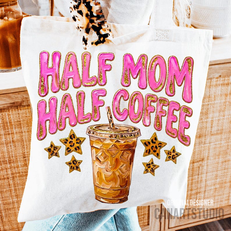 May include: White tote bag with the text "HALF MOM HALF COFFEE" in pink letters with gold glitter trim. A detailed illustration of an iced coffee drink and leopard print stars are also featured on the bag.