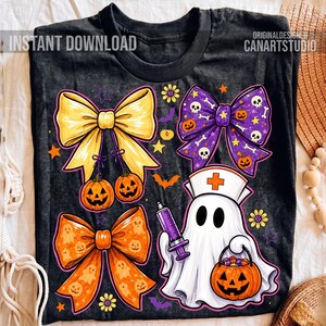 May include: A black t-shirt featuring a graphic print of three decorative bows in yellow, purple, and orange, alongside a white ghost wearing a nurse cap and holding a purple syringe and a jack-o'-lantern bucket filled with candy.
