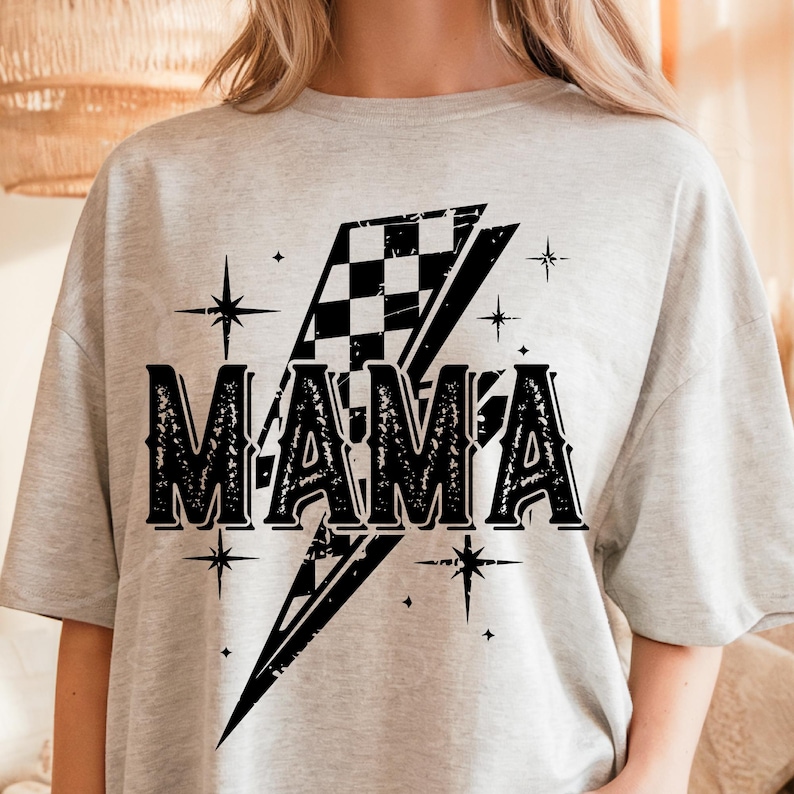 May include: Gray t-shirt with a black and white checkered lightning bolt design and the word "MAMA" in a vintage font.