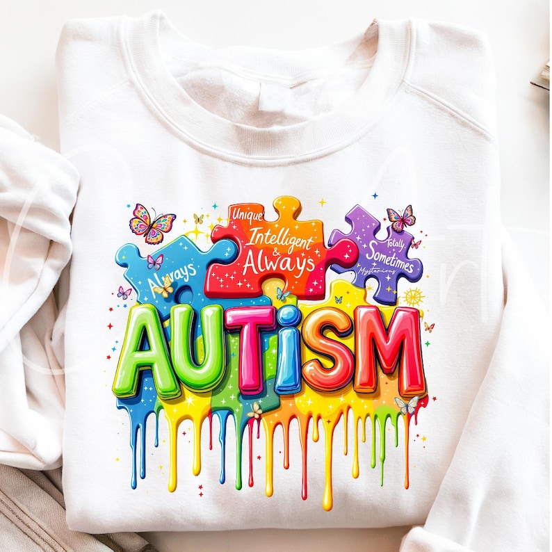 Colorful puzzle pieces with motivational phrases and dripping rainbow design surrounding bold multicolored text reading 'AUTISM.' Perfect for awareness and crafting projects.