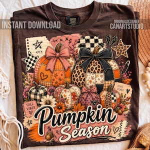 May include: A dark brown t-shirt featuring a graphic print of multiple pumpkins with various patterns including leopard print, plaid, and floral. The design includes bows, stars, hearts, and the text "FALL VIBES", "GOOD TIMES", and "Pumpkin Season".