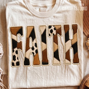 May include: A cream-colored t-shirt featuring the word FAITH in large, block-style letters. Each letter is filled with a patchwork of brown, black, and white animal print patterns and is outlined with a border of small, white, round beads.
