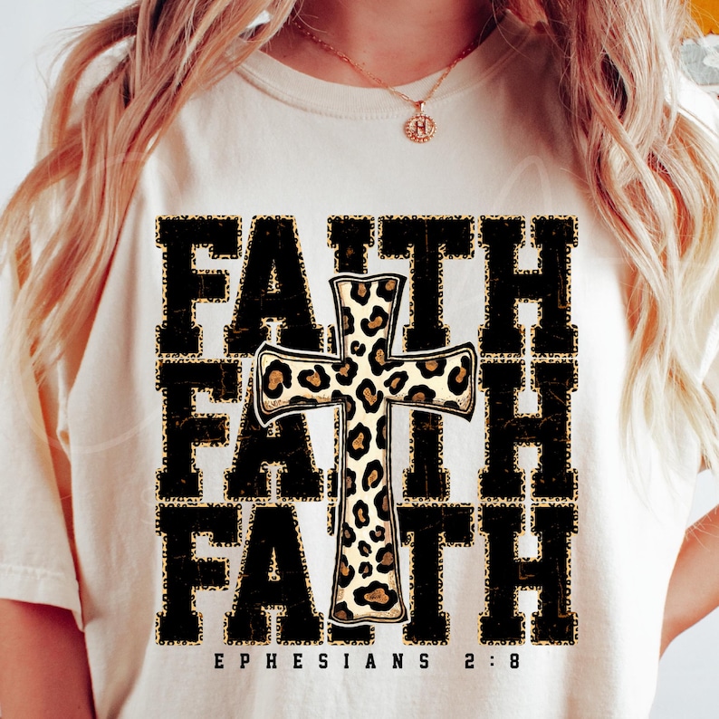 A bold "FAITH" design with black distressed block letters outlined in cheetah print. A large leopard-patterned cross is centered, featuring a hand-drawn rustic style, adding a Western-inspired spiritual aesthetic.