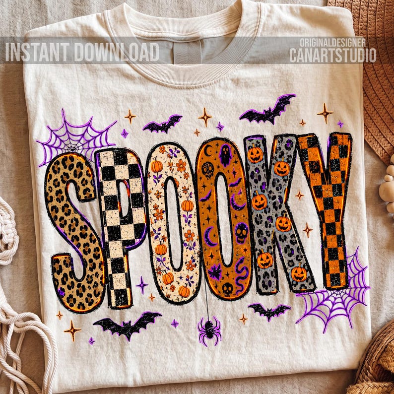 May include: Cream-colored t-shirt with the word "SPOOKY" in a colorful, patterned design. The letters feature leopard print, checkerboard, and floral patterns, with Halloween-themed accents like pumpkins, bats, and spiderwebs. Text at the top reads "INSTANT DOWNLOAD".