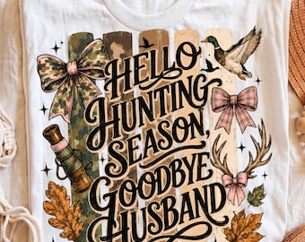 May include: A white t-shirt featuring a graphic with the text HELLO HUNTING SEASON, GOODBYE HUSBAND. The design includes a camouflage bow, a duck call, a mallard duck, a plaid bow, deer antlers with a pink bow, and autumn leaves on stripes.