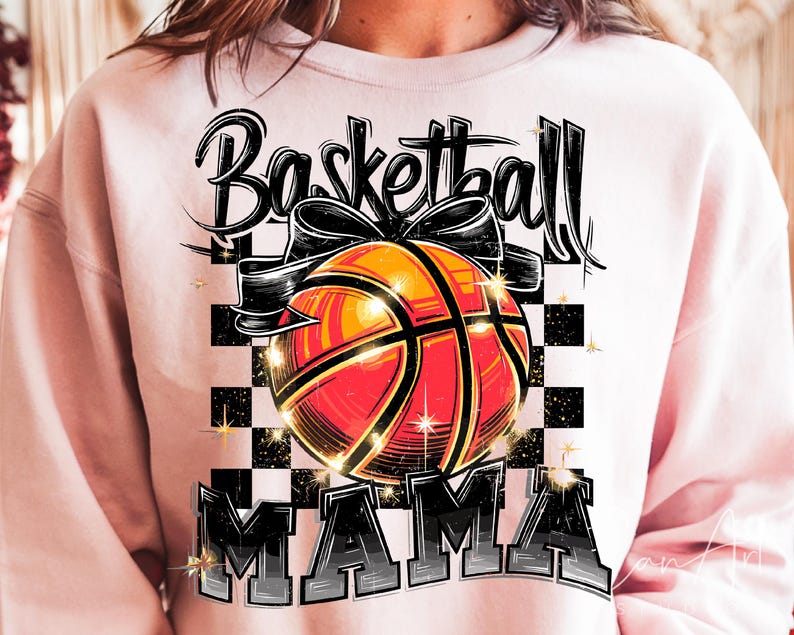 May include: Pink sweatshirt with a black and white graphic design of a basketball with the text "Basketball Mama".