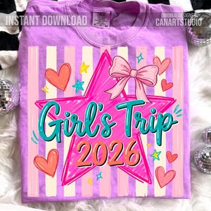 May include: A lilac-colored t-shirt with a large pink star design. The star contains the words "Girl's Trip 2026" in teal and orange, with a pink bow and hearts. The shirt has vertical stripes and the words "Instant Download".