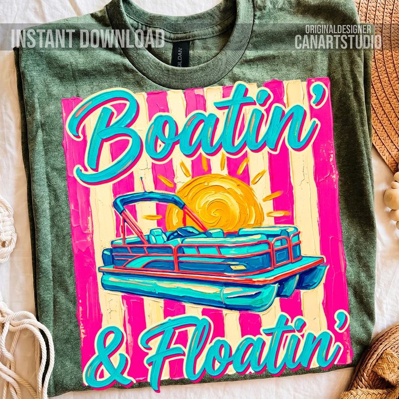 May include: Green t-shirt with a vibrant graphic. The graphic features a pontoon boat in shades of blue, a yellow sun, and the words "Boatin' & Floatin'" in turquoise script. The words "Instant Download" and "Original Designer Canartstudio" are also visible.