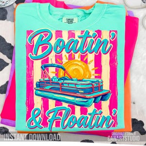May include: A turquoise Comfort Colors t-shirt with a graphic that says "Boatin' & Floatin'" in a retro font. The graphic features a pontoon boat, a sun, and vertical stripes in pink, yellow, and turquoise. The words "Instant Download" are at the bottom.
