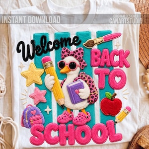 May include: A white t-shirt featuring a graphic of a duck wearing pink sunglasses and a leopard print bow, holding a yellow pencil and a purple book. The design includes the text Welcome Back To School, a red apple, and a purple backpack.