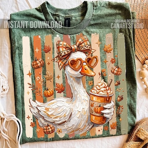 Puede incluir: Camiseta verde con una ilustraci&oacute;n de un pato con gafas de sol en forma de coraz&oacute;n y un lazo, sosteniendo un caf&eacute; con leche de calabaza. El dise&ntilde;o incluye calabazas, hojas y el texto "INSTANT DOWNLOAD".