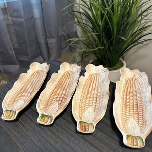 Vintage set of 4 corn cob holder dishes